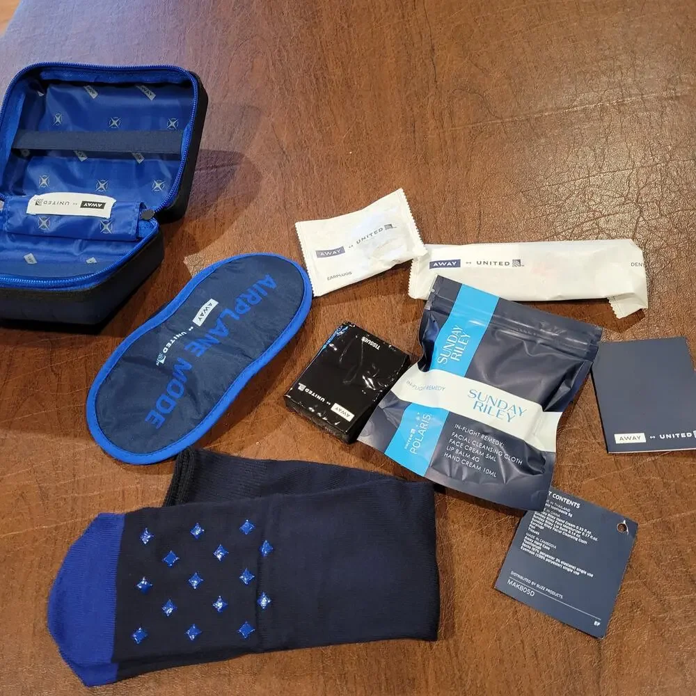 New AWAY Travel The Mini Suitcase Toiletry Case United Polaris Amenity Kit Pouch